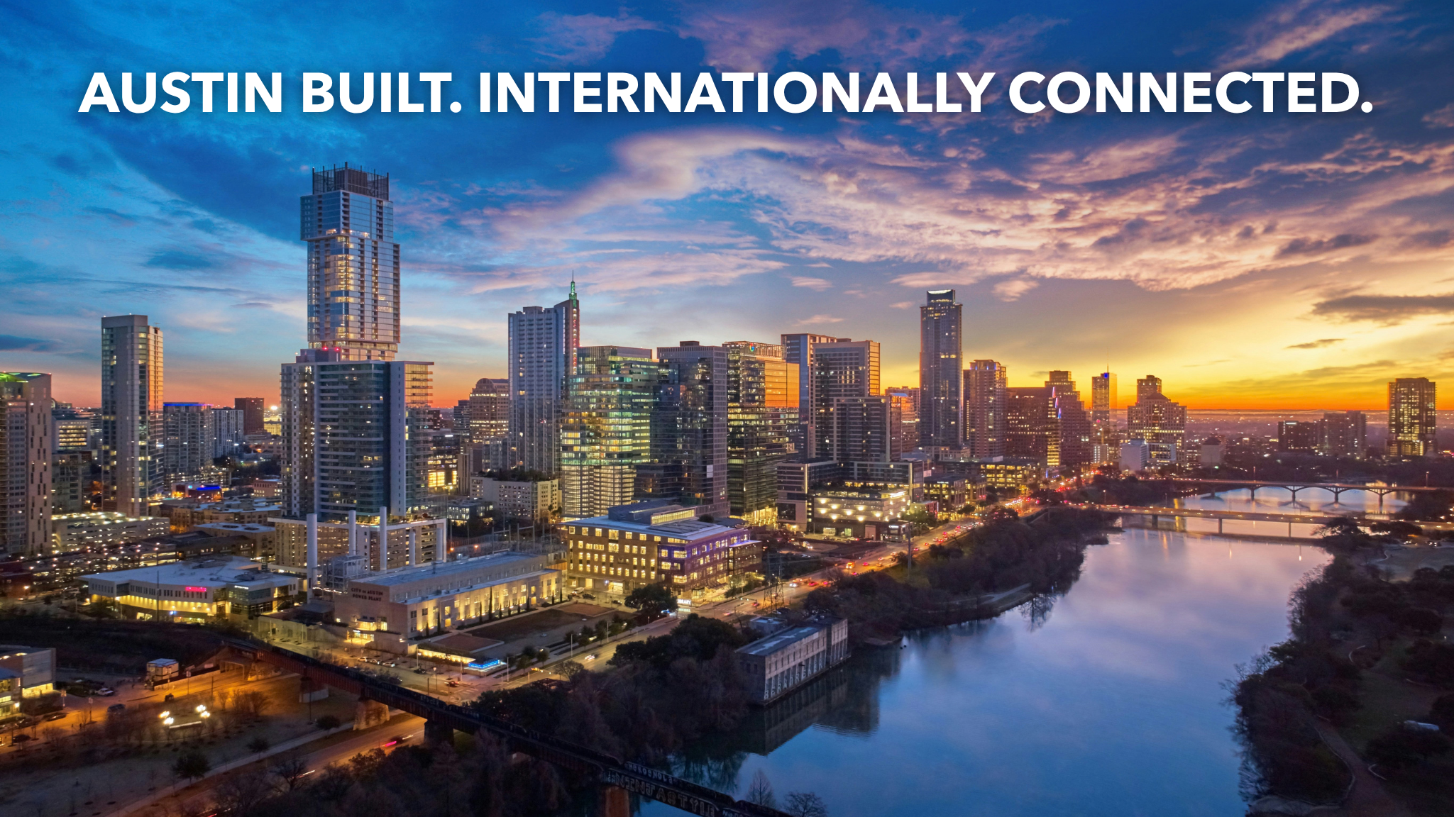 Austin skyline at sunset – Austin Built. Internationally Connected.